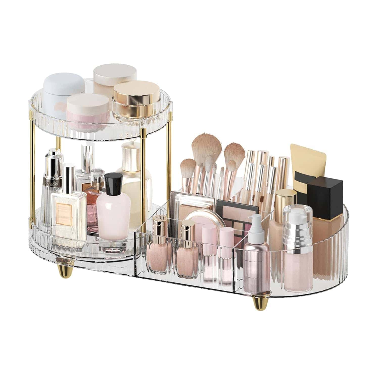 A clear acrylic organizer holds makeup brushes, lipsticks, skincare jars, bottles, and tubes, arranged neatly on a white background.