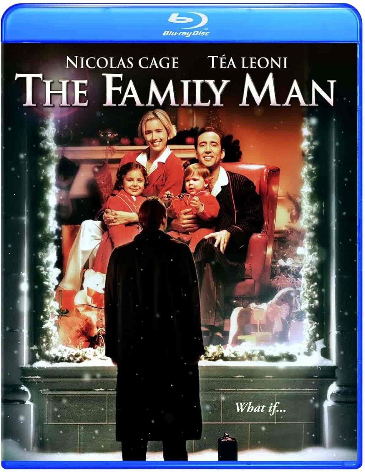 Blu-ray cover of "The Family Man" showing a man looking at a family of four through a window, with a festive background and the tagline "What if...".