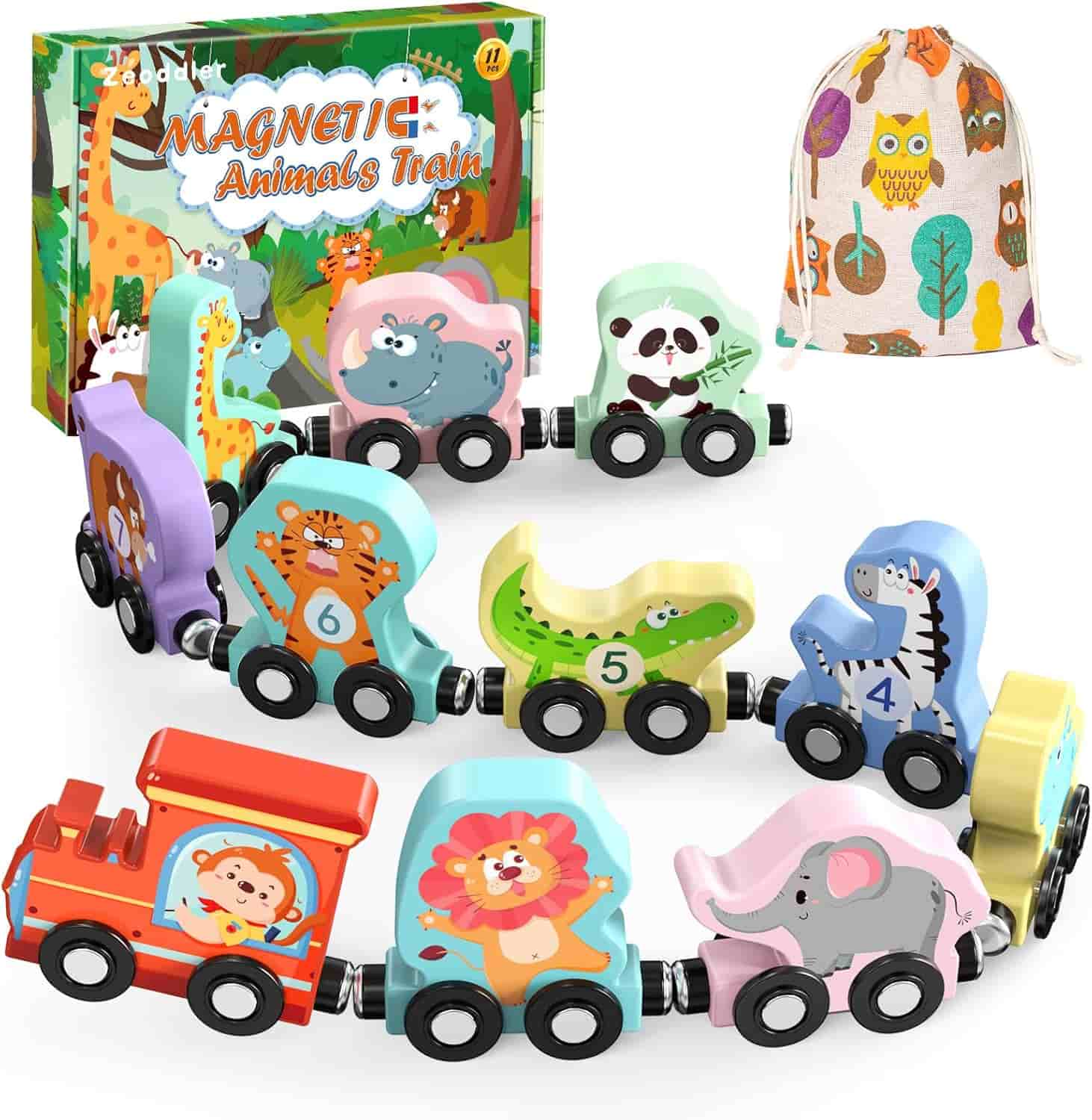 A colorful wooden magnetic animal train toy set with numbered animal-shaped cars, a red engine, gift box, and a drawstring storage bag with owl prints.