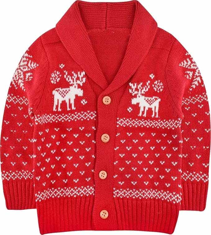 Red knit cardigan with wooden buttons, featuring white reindeer and snowflake patterns, and a shawl collar.