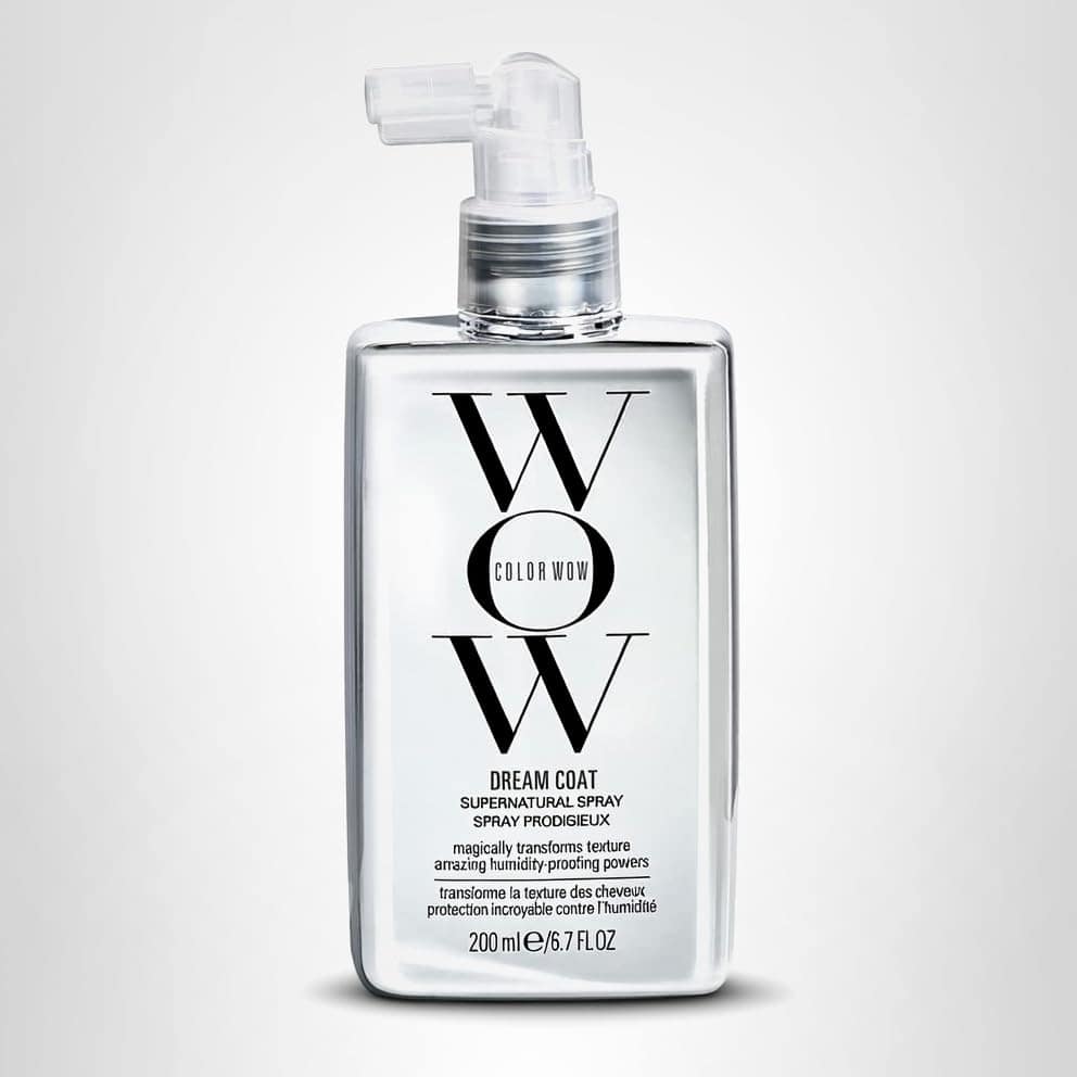 A clear spray bottle labeled "Color Wow Dream Coat Supernatural Spray" with a spray nozzle, containing 200 ml of product.