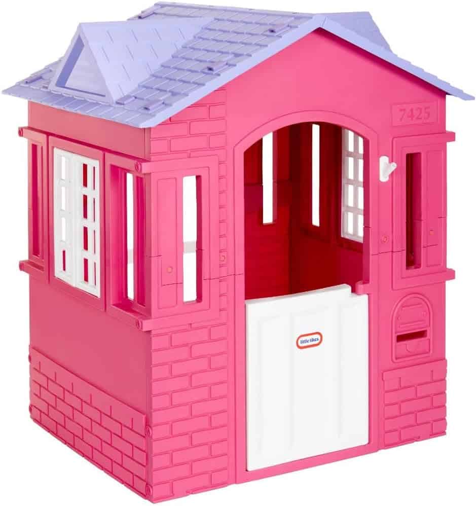 Pink and purple plastic playhouse with white windows and a half-door, designed for children.