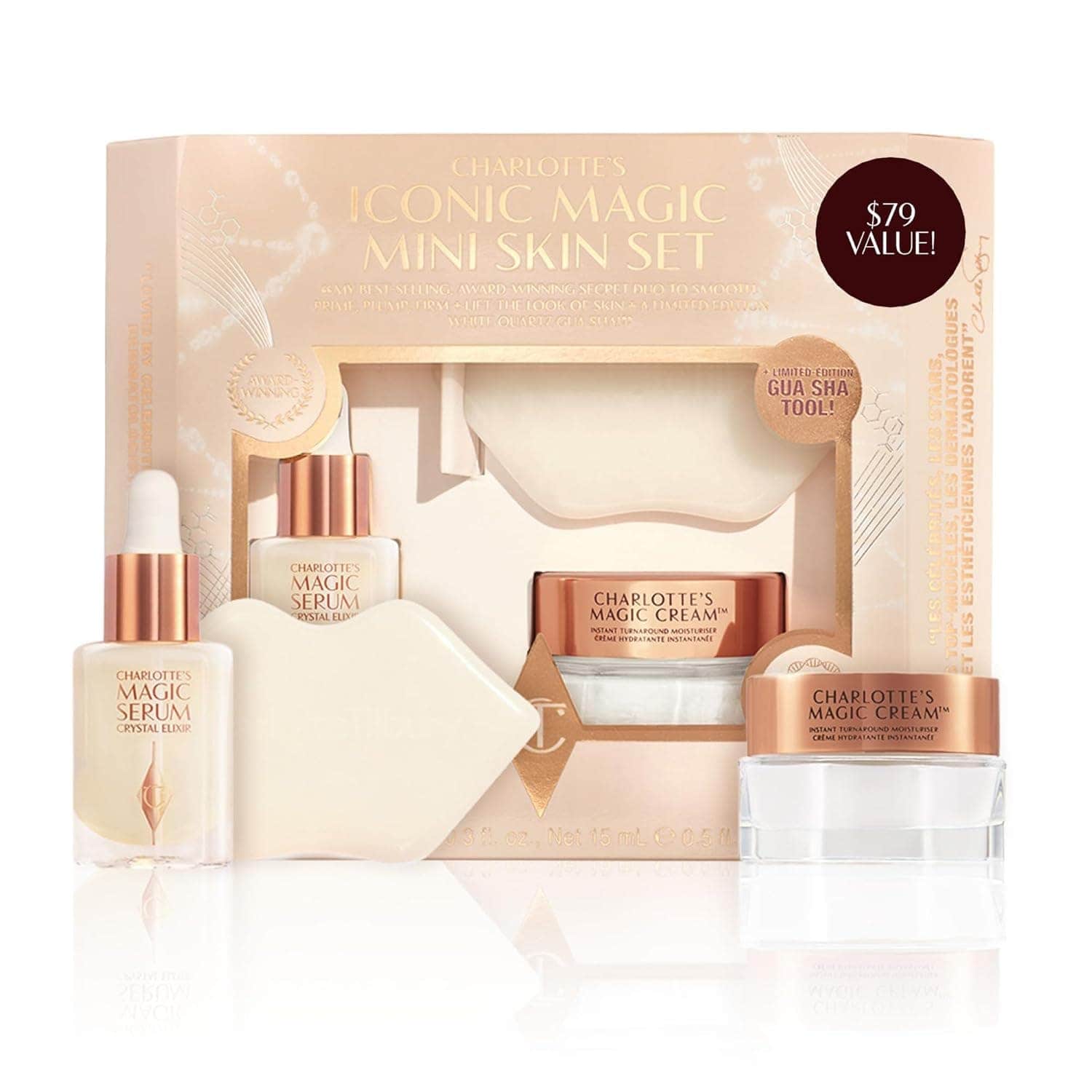 Charlotte Tilbury Iconic Magic Mini Skin Set includes two jars of Magic Cream, a Magic Serum bottle, and a white gua sha tool, all in a cream and rose gold packaging.