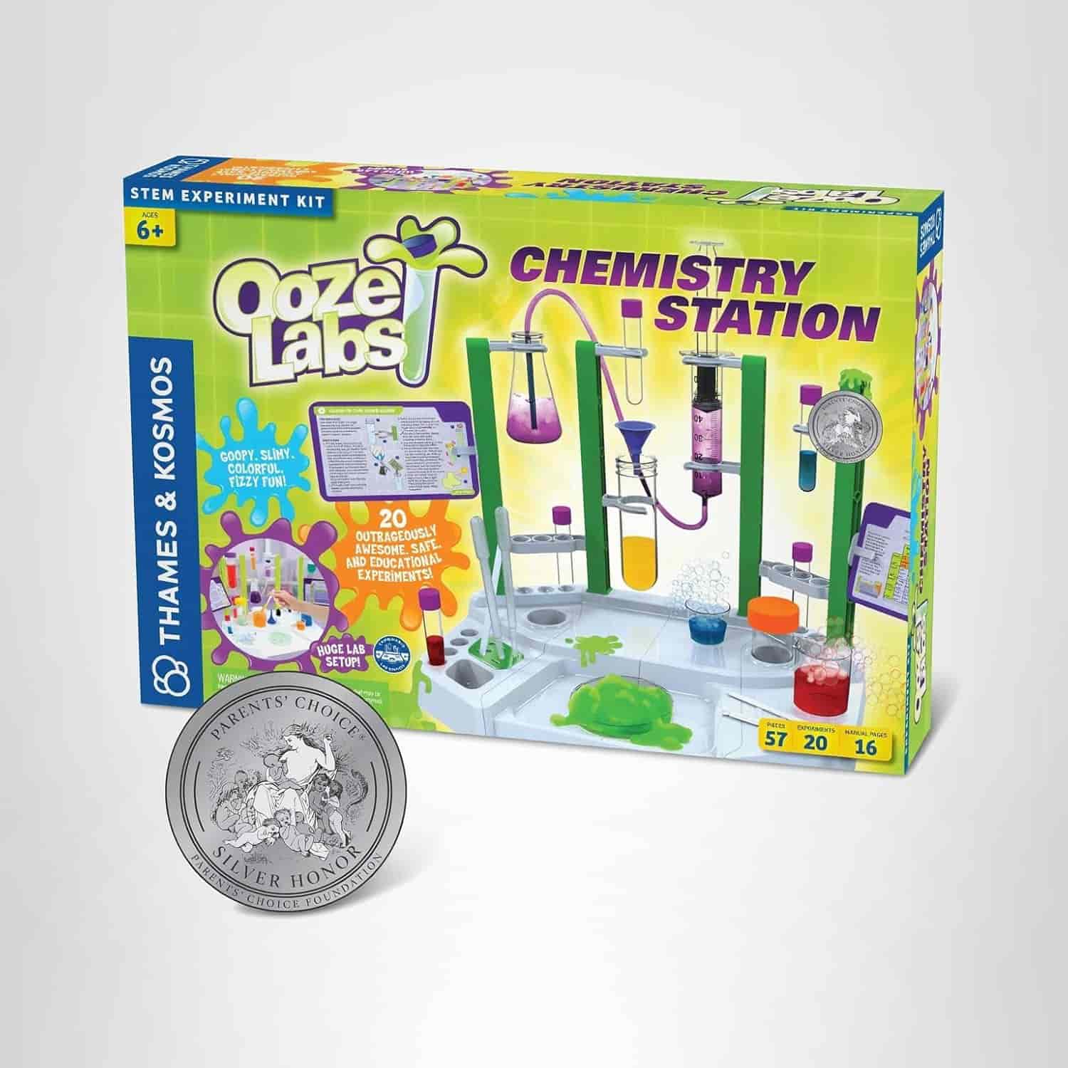 Box for Ooze Labs Chemistry Station STEM experiment kit for ages 6+, showing colorful lab equipment, experiment cards, and a silver Parents' Choice award medallion.