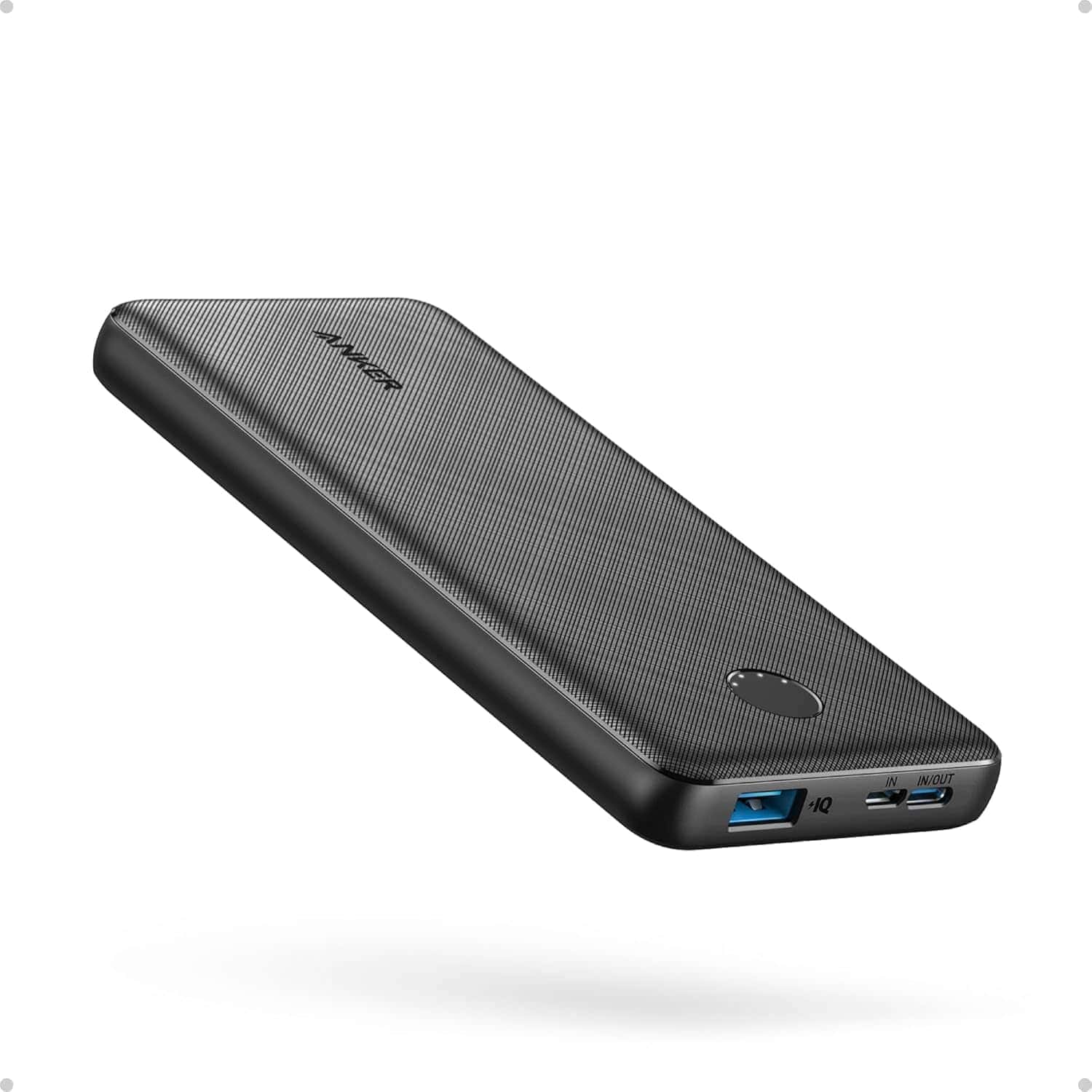 A black Anker portable power bank with two USB ports and a textured surface, shown against a plain white background.