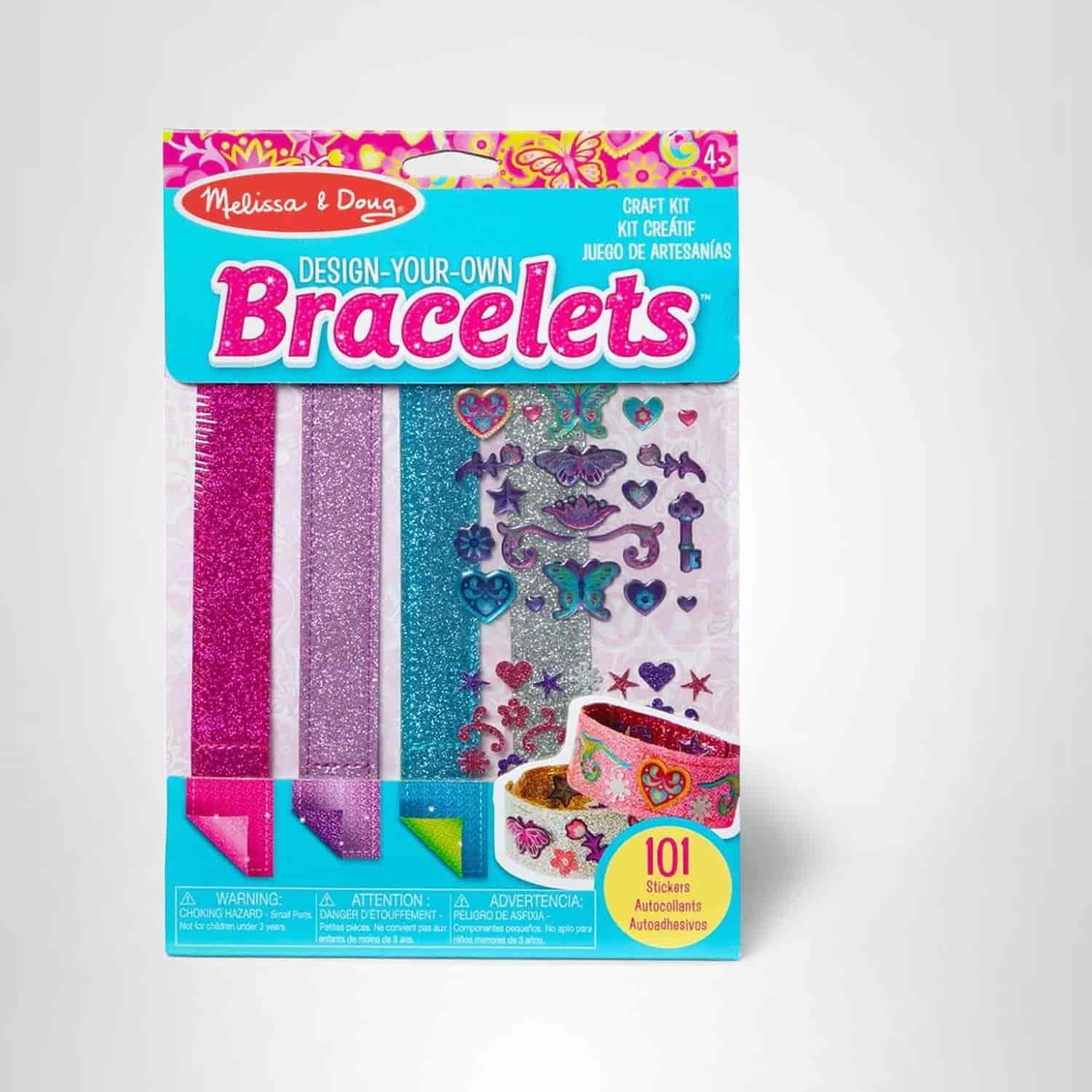A Melissa & Doug Design-Your-Own Bracelets craft kit with glittery straps and 101 colorful stickers in the packaging.