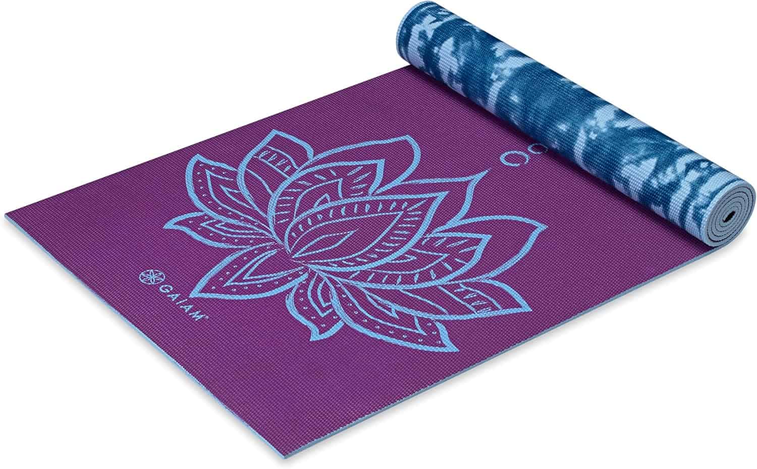 A rolled-up purple yoga mat with a large blue lotus flower design and a blue and white tie-dye pattern on the underside.
