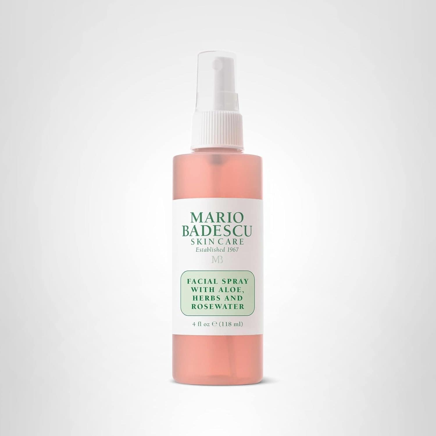 A bottle of Mario Badescu Facial Spray with Aloe, Herbs, and Rosewater, 4 fl oz, on a plain light background.
