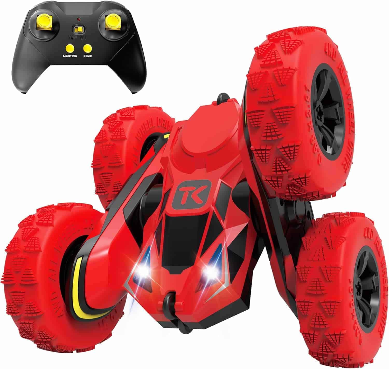 Red remote control stunt car with large textured wheels and LED headlights, shown with a black wireless controller.