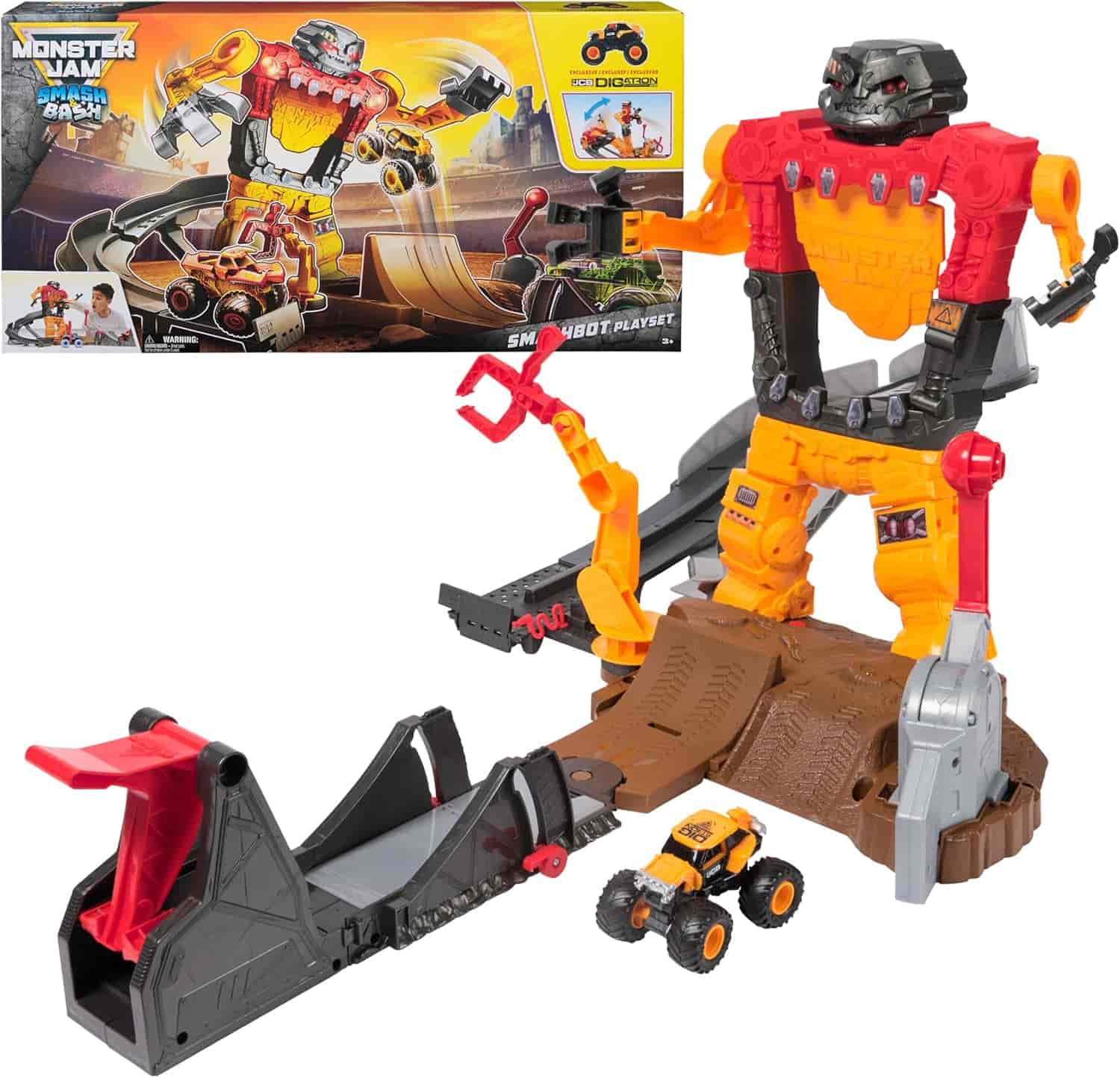 Monster Jam playset featuring a large robot figure, ramp, and small monster truck toy; box packaging is shown in the background.