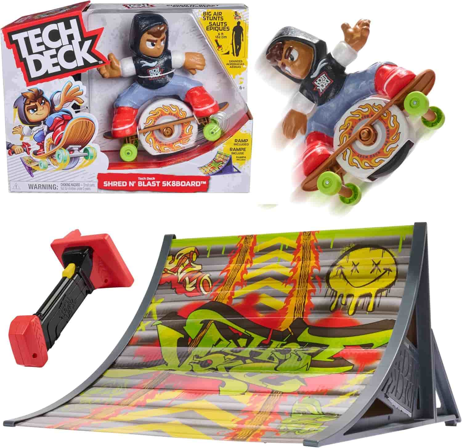 Tech Deck Shred N’ Blast Sk8board toy set, featuring a figure on a skateboard, remote control, and a graffiti-designed ramp, with packaging shown in the background.