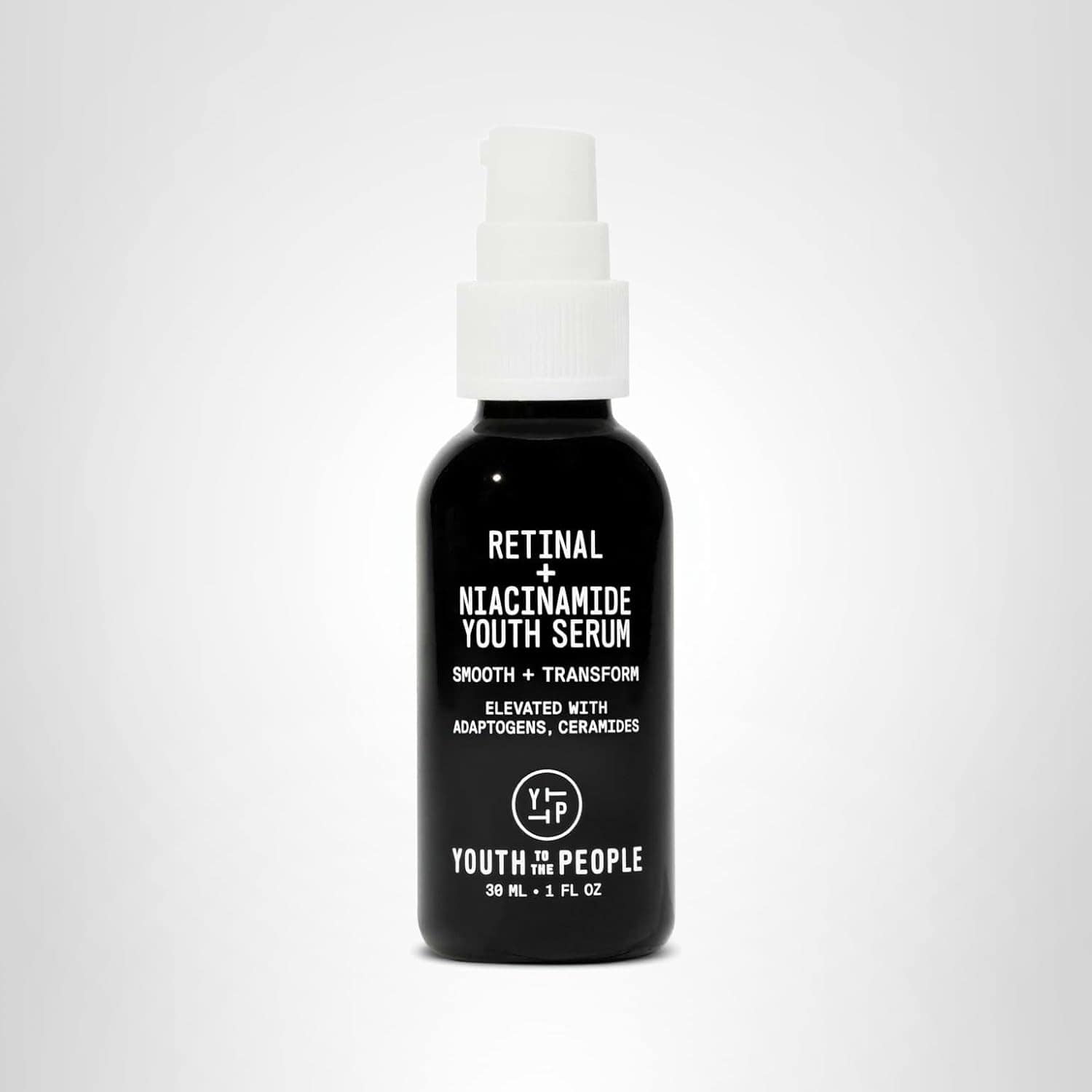 A black bottle of Youth to the People Retinal + Niacinamide Youth Serum with a white pump dispenser, containing 30 mL (1 fl oz) of product.