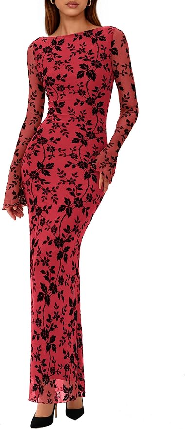 Woman wearing a long-sleeve, floor-length pink dress with black floral patterns, fitted silhouette, and black high heels.