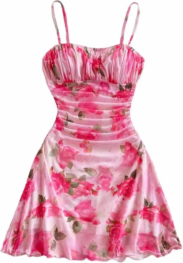 Pink floral spaghetti strap dress with ruched bodice and flared skirt, featuring a rose print pattern on a light background.