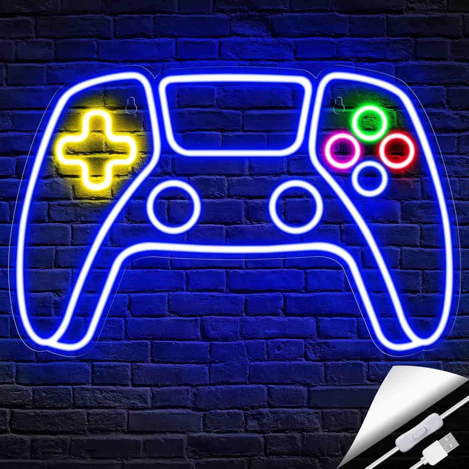 Neon sign in the shape of a video game controller is mounted on a dark brick wall, featuring blue, yellow, green, pink, and red lights.
