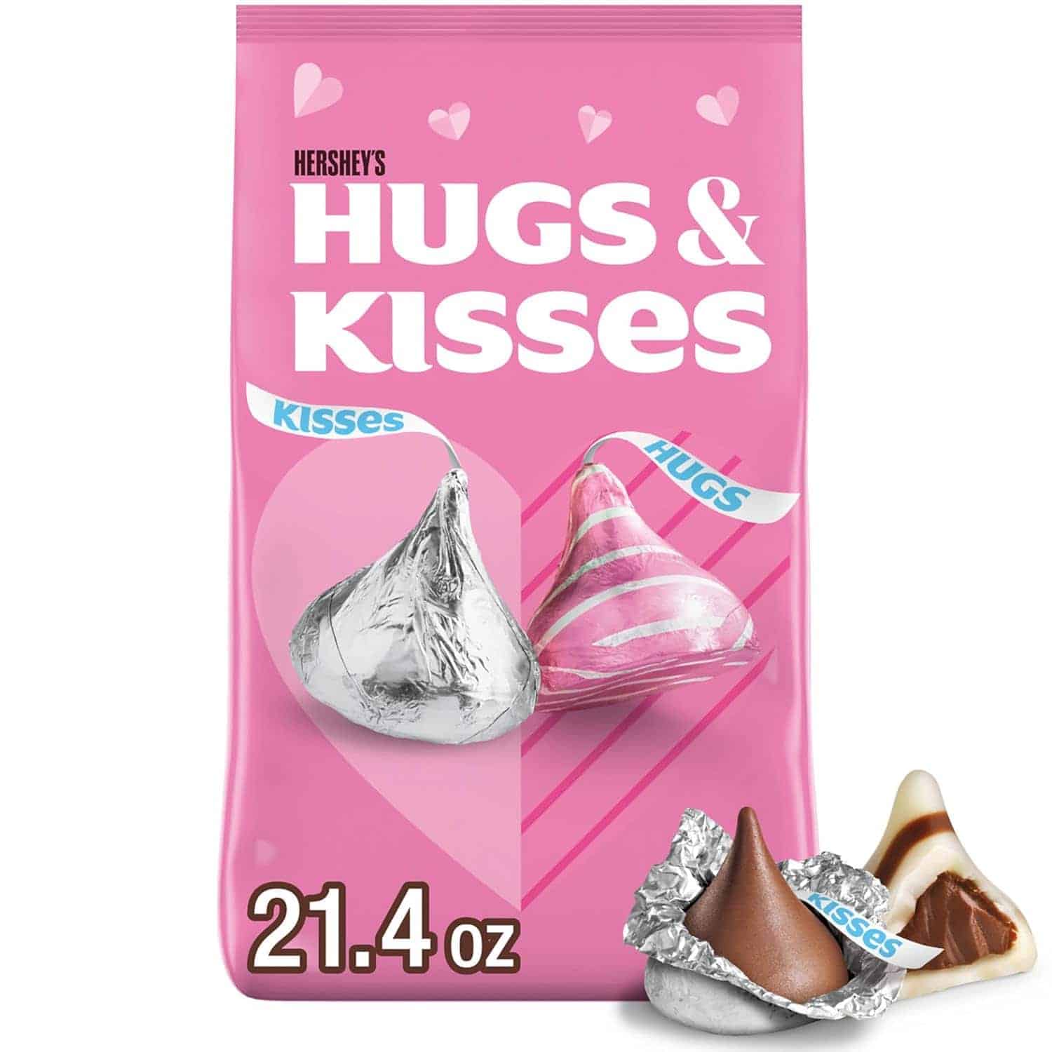 A 21.4 oz bag of Hershey’s Hugs & Kisses chocolates is shown, with images of the foil-wrapped candies on the pink packaging.
