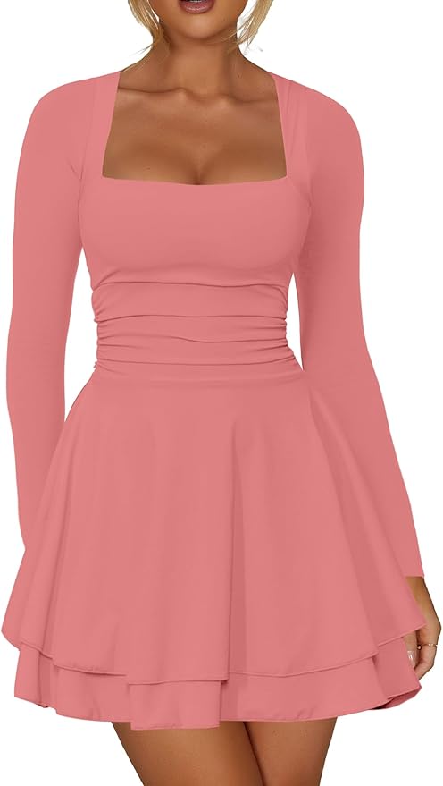 A woman wearing a long-sleeve, square-neck, ruched pink dress with a flared, layered skirt.