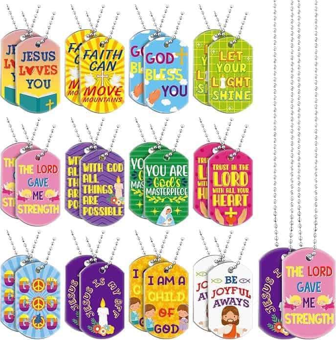A set of colorful dog tag necklaces features Christian messages and symbols, such as “JESUS LOVES YOU,” “GOD BLESS YOU,” and crosses, displayed in four rows.