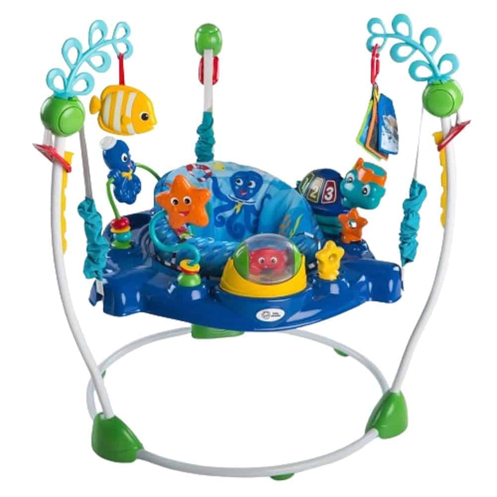 Colorful baby activity jumper featuring an ocean theme, hanging toys, and a central seat surrounded by interactive elements.