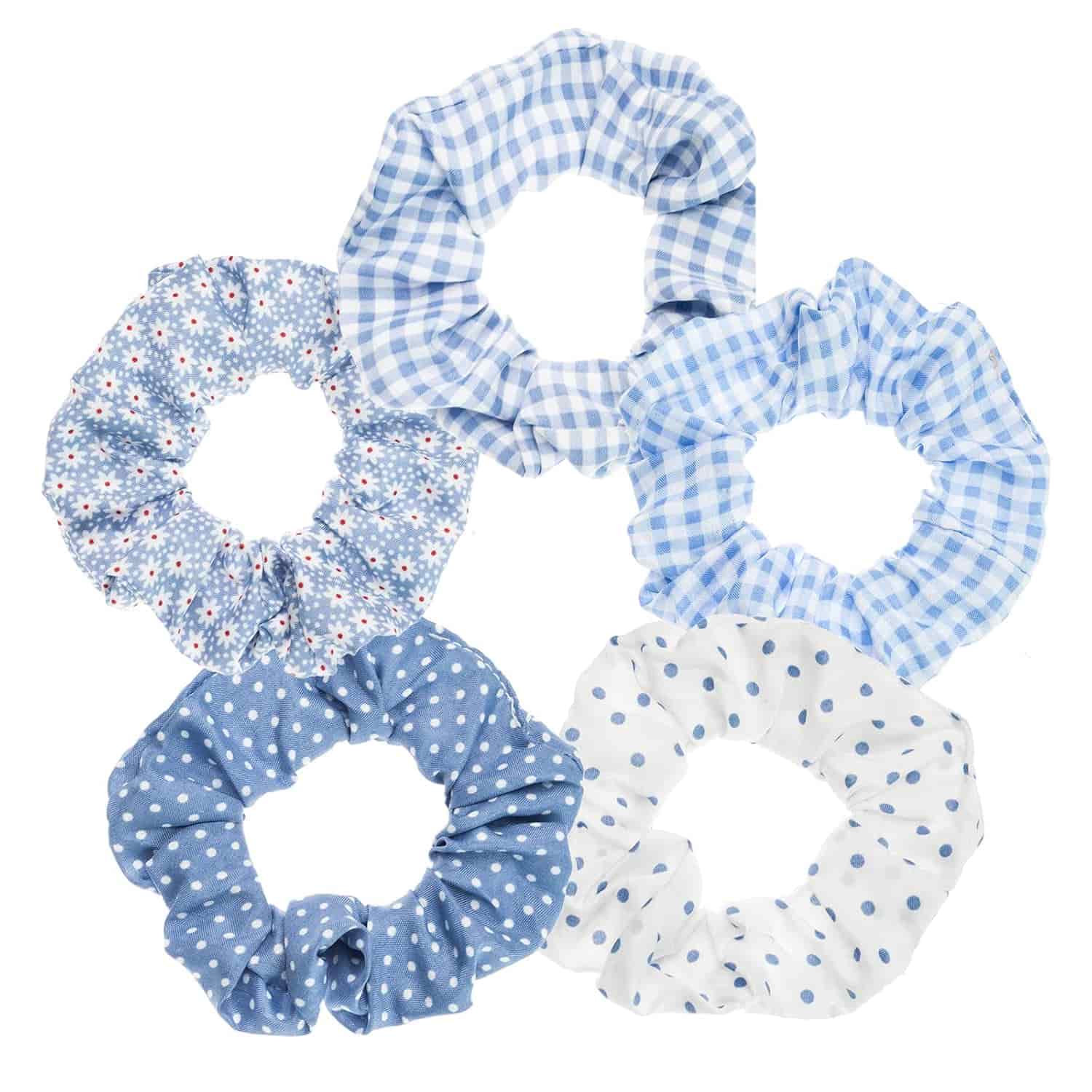 Five blue and white patterned scrunchies are arranged in a circle, each with a different design including gingham, polka dots, and floral prints.