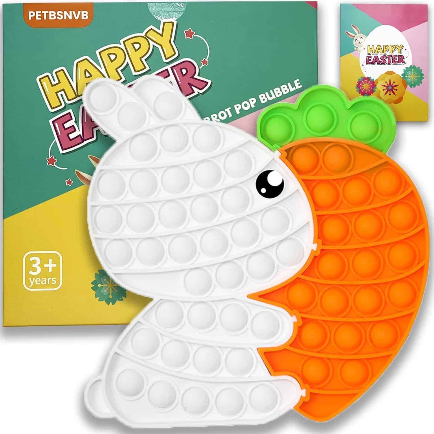 A bunny and carrot-shaped pop bubble toy set with packaging labeled "Happy Easter," suitable for ages 3 and up.