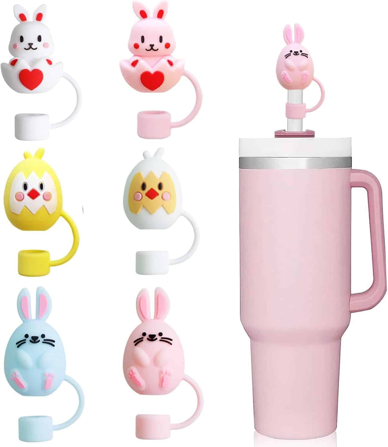 A pink cup with a straw features a pink bunny straw topper. Six additional animal-themed straw toppers, including bunnies and chicks, are displayed alongside the cup.