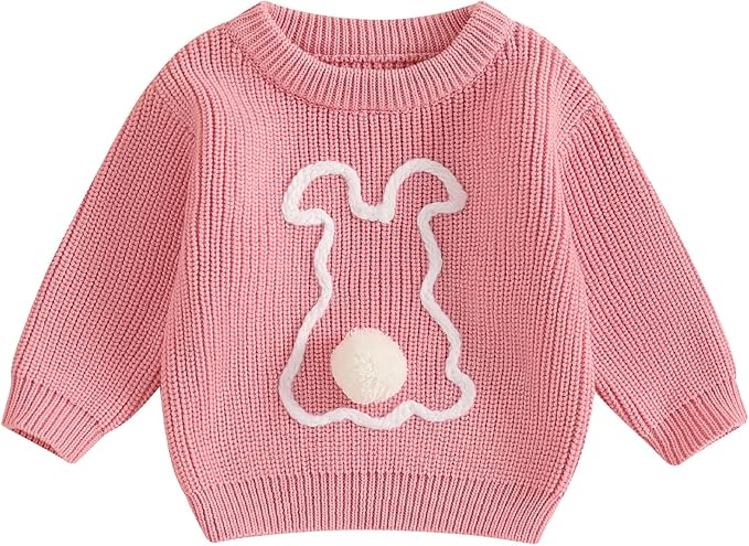 Pink knitted sweater with a white bunny outline and a fluffy white pom-pom tail on the front.