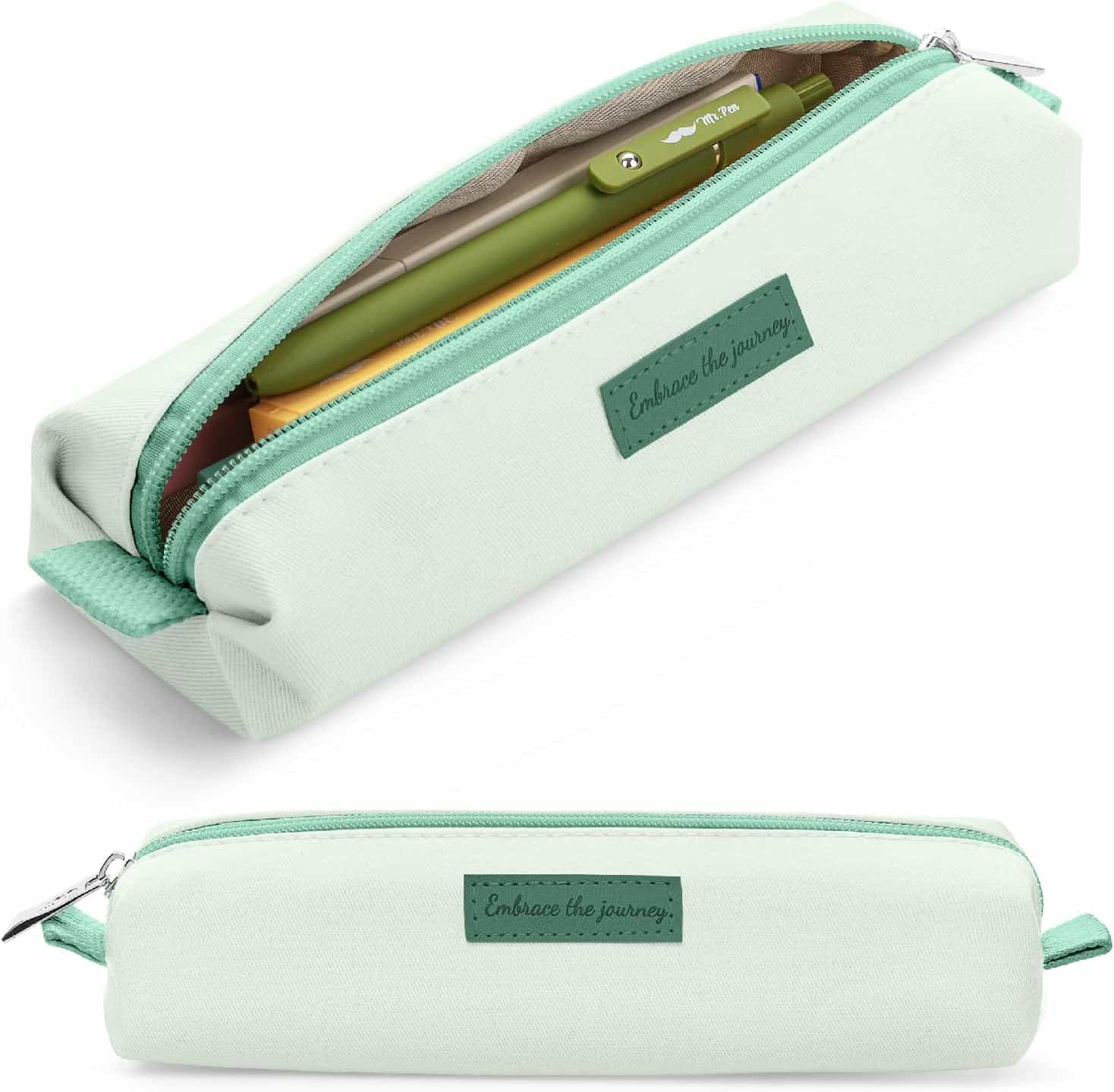Light green pencil case with a zipper, containing pens and pencils. The label on the front reads "Embrace the journey." Two views are shown: one open, one closed.