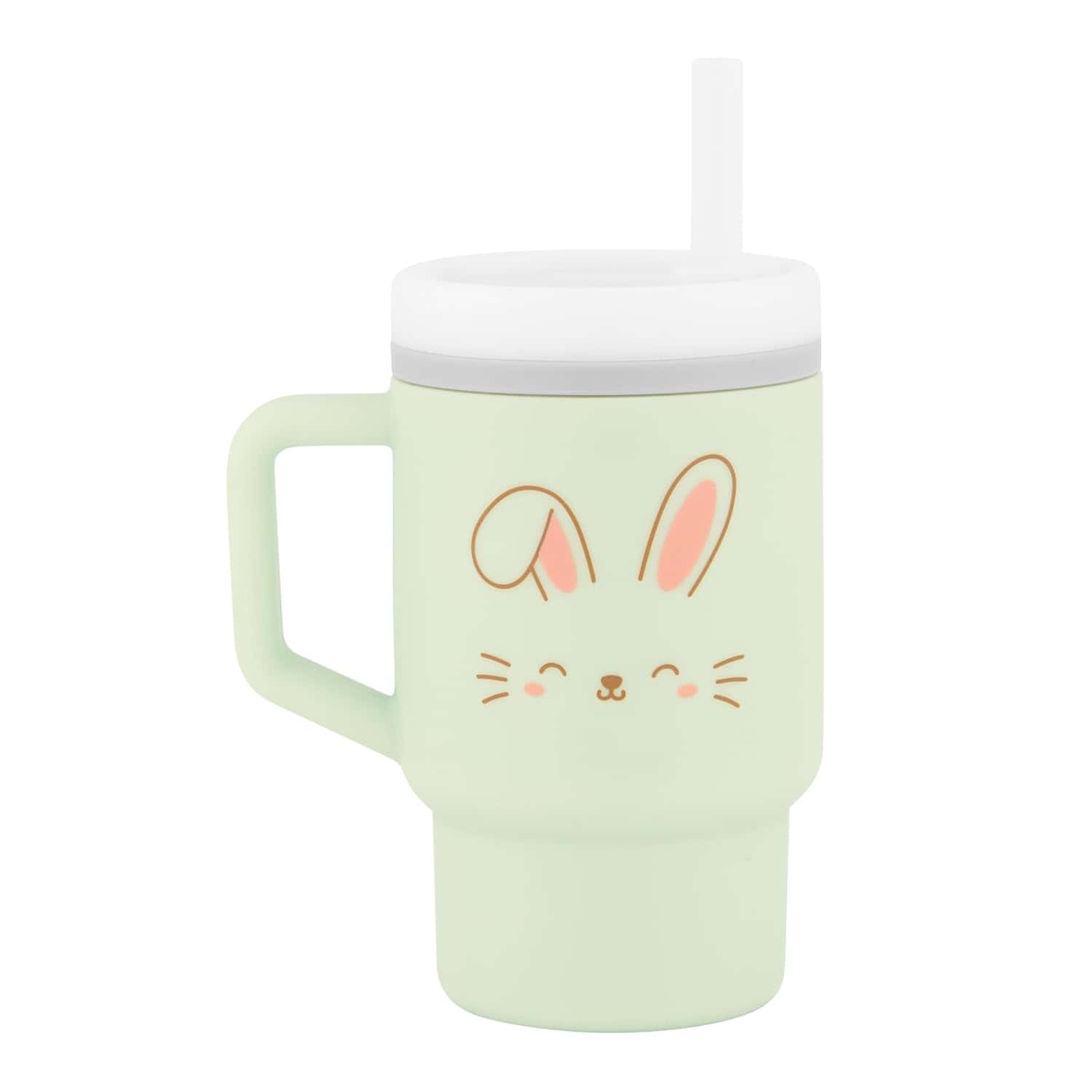 A light green plastic cup with a handle, white lid, and straw, featuring a cute bunny face illustration on the side.