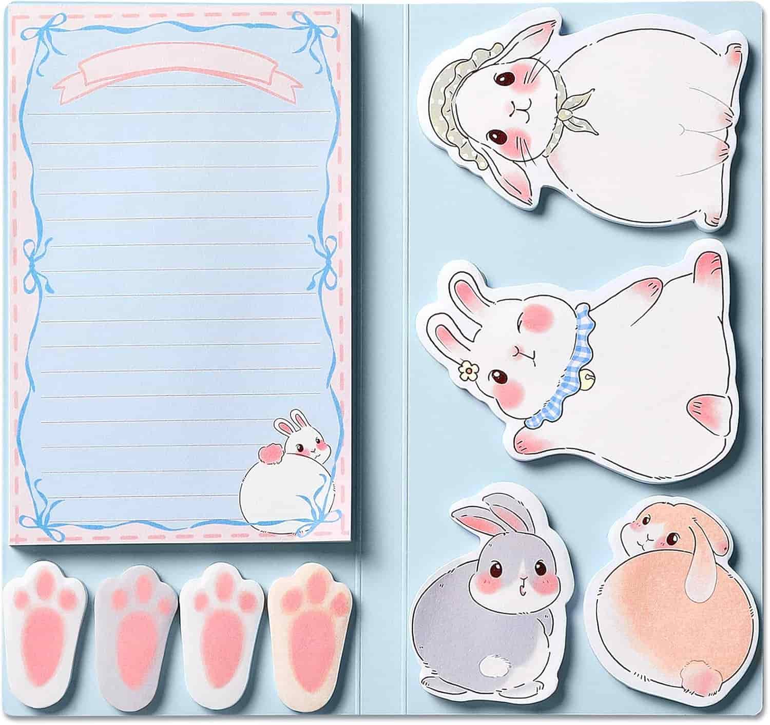 A stationery set with lined notepaper, bunny-shaped sticky notes in various poses, and paw-shaped sticky tabs, all decorated with cute rabbit illustrations.