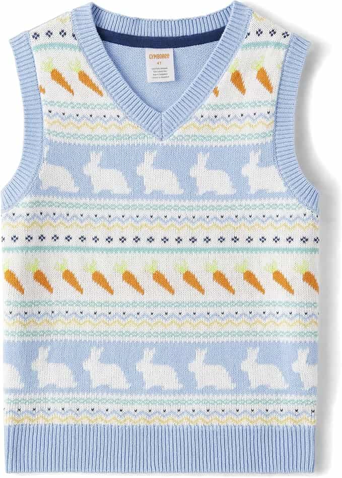 Light blue sleeveless sweater vest with white rabbit and orange carrot patterns, featuring pastel stripe details and a v-neck design.