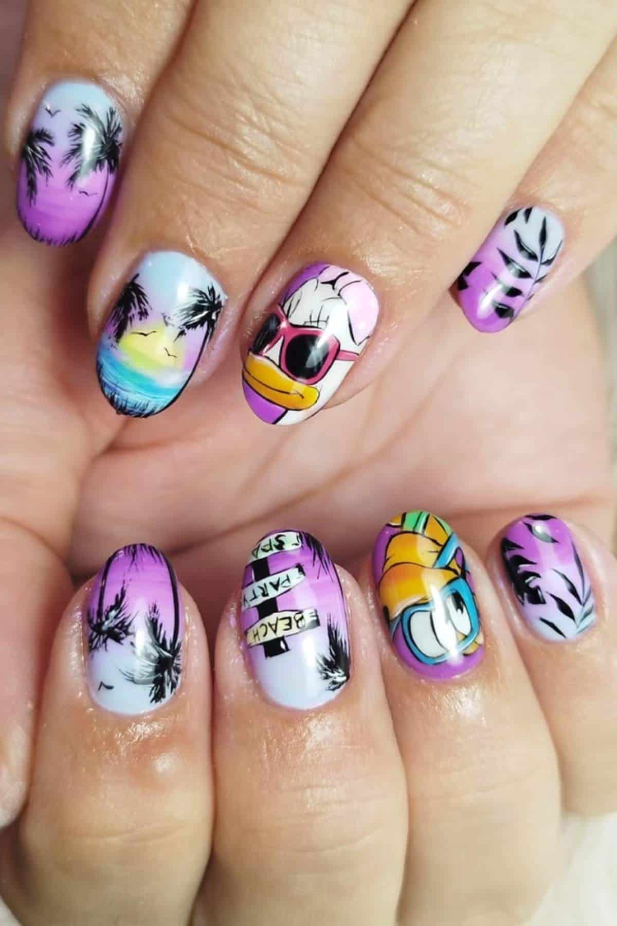 Fingernails with colorful nail art featuring palm trees, a sunset, and cartoon duck faces on a purple and blue gradient background.