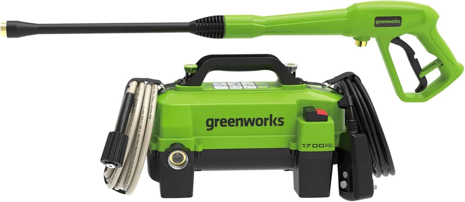 Greenworks 1700 PSI portable electric pressure washer with hose, spray wand, and power cord attached.