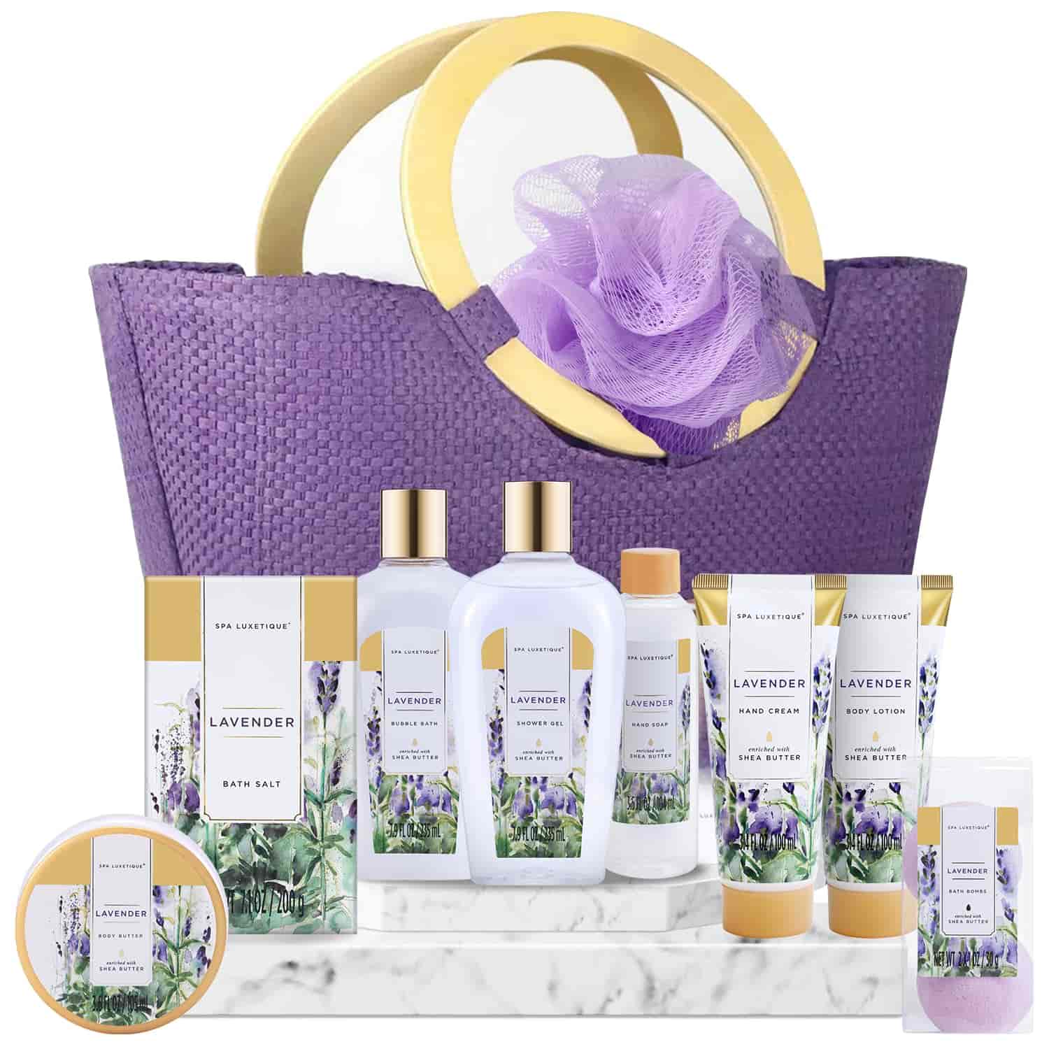 A purple and gold gift basket containing lavender-scented bath products, such as lotion, bath salt, body wash, creams, and a purple bath pouf.