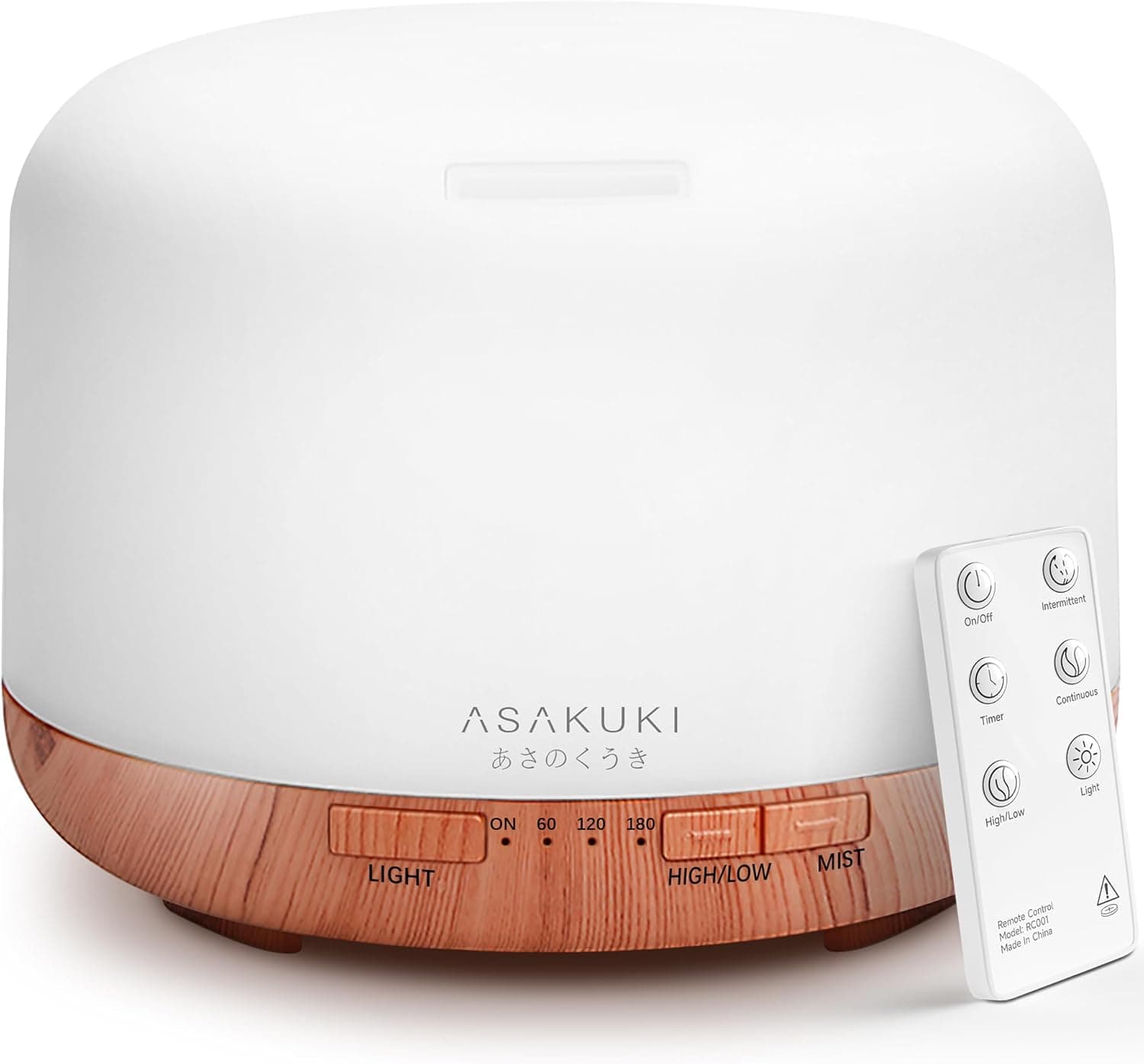 A white and wood-grain ASAKUKI essential oil diffuser with control buttons on the front and a remote control beside it.