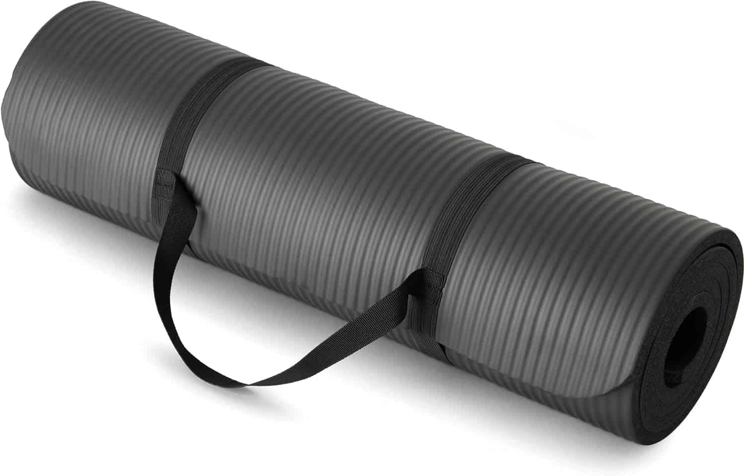 A rolled-up black exercise mat with a textured surface and a carrying strap, placed on a plain white background.