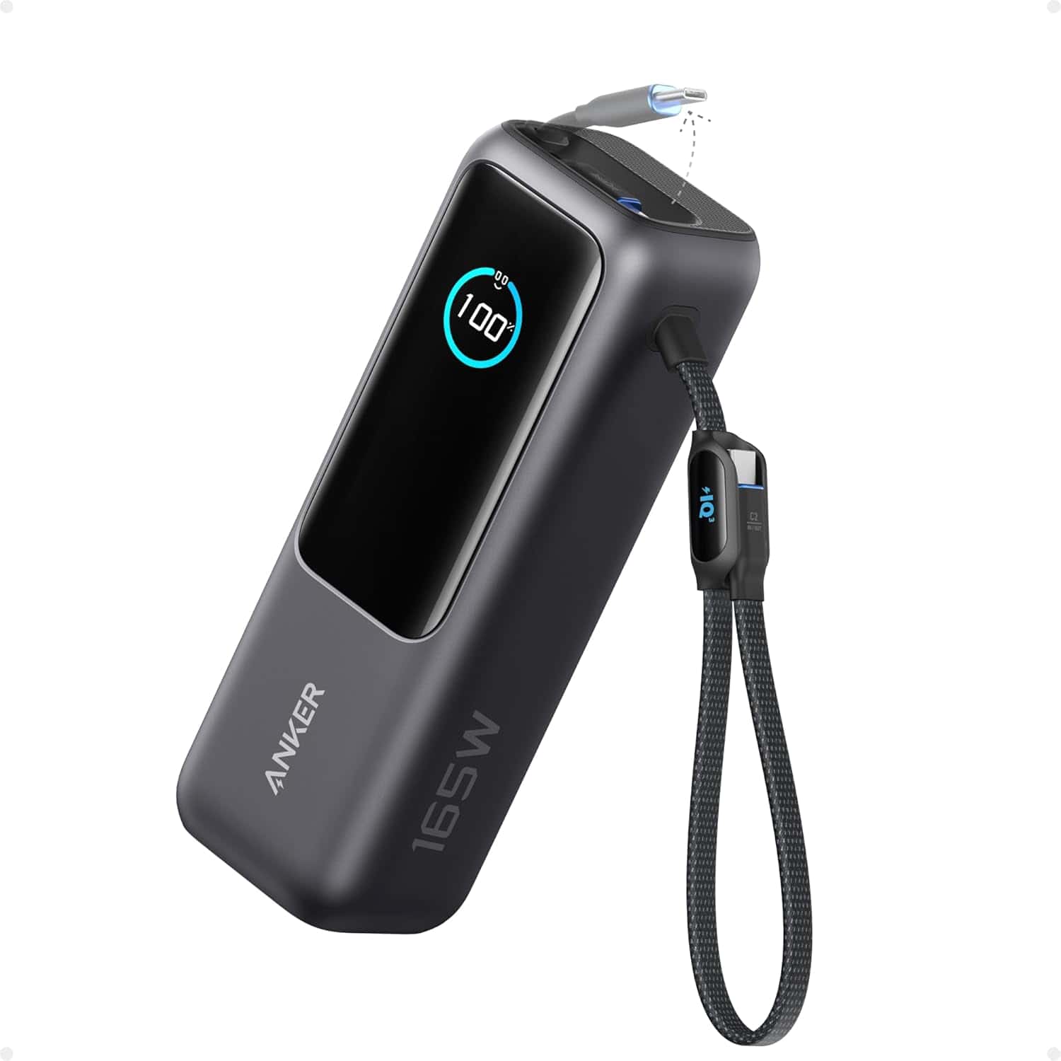 A black Anker 165W portable power bank with a digital display showing 100%, a braided wrist strap, and a USB-C cable attached.