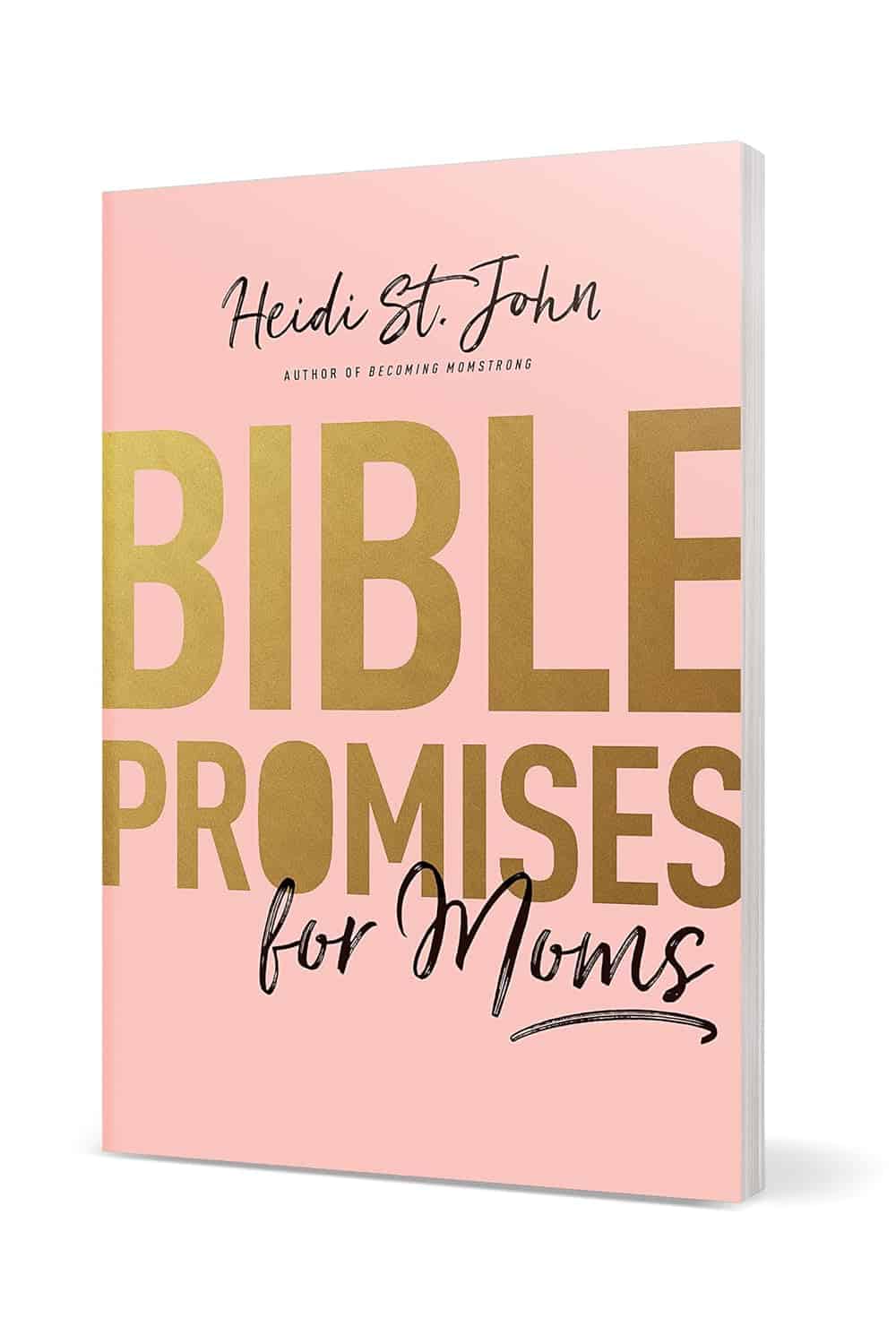 A pink book titled "Bible Promises for Moms" by Heidi St. John, with large gold and black lettering on the cover.