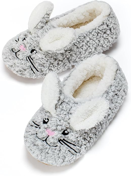 A pair of fuzzy gray slippers designed to look like bunnies, featuring embroidered faces, pink noses, and floppy ears.