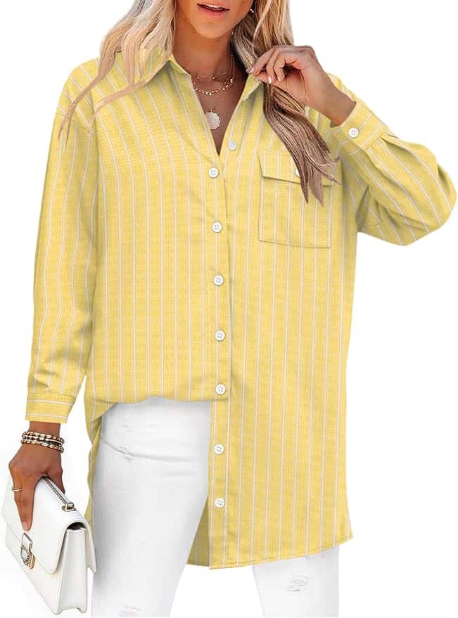 A person wearing a long-sleeve yellow and white striped button-up shirt with a chest pocket, white distressed pants, and holding a white clutch.