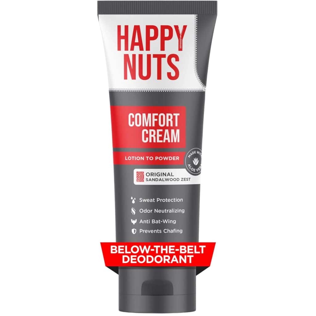 A tube of Happy Nuts Comfort Cream, labeled as below-the-belt deodorant with sandalwood zest, sweat protection, odor neutralizing, anti bat-wing, and chafing prevention.