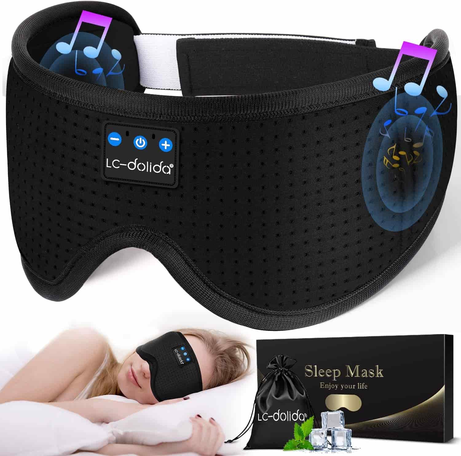 Black Bluetooth sleep mask with built-in speakers shown on its own and worn by a woman lying in bed; product box and pouch also displayed.