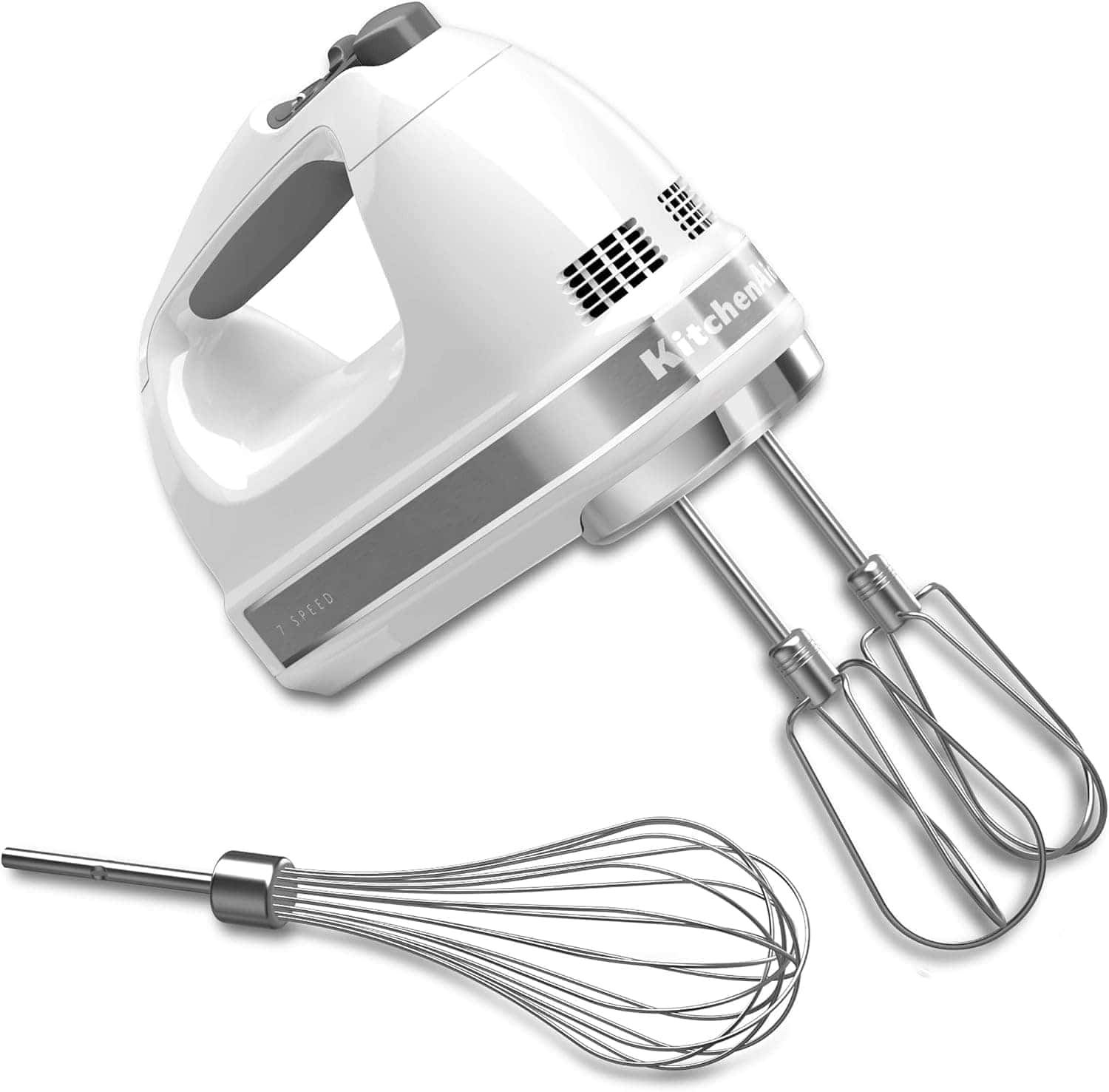 A white handheld electric mixer with two metal beaters attached and a separate whisk attachment lying beside it.