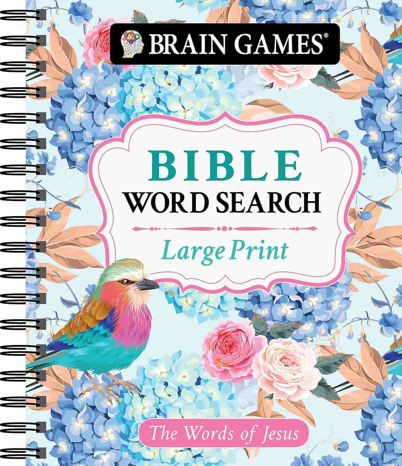 Spiral-bound "Bible Word Search" book with floral and bird illustrations on the cover, labeled "Large Print," and "The Words of Jesus" at the bottom.