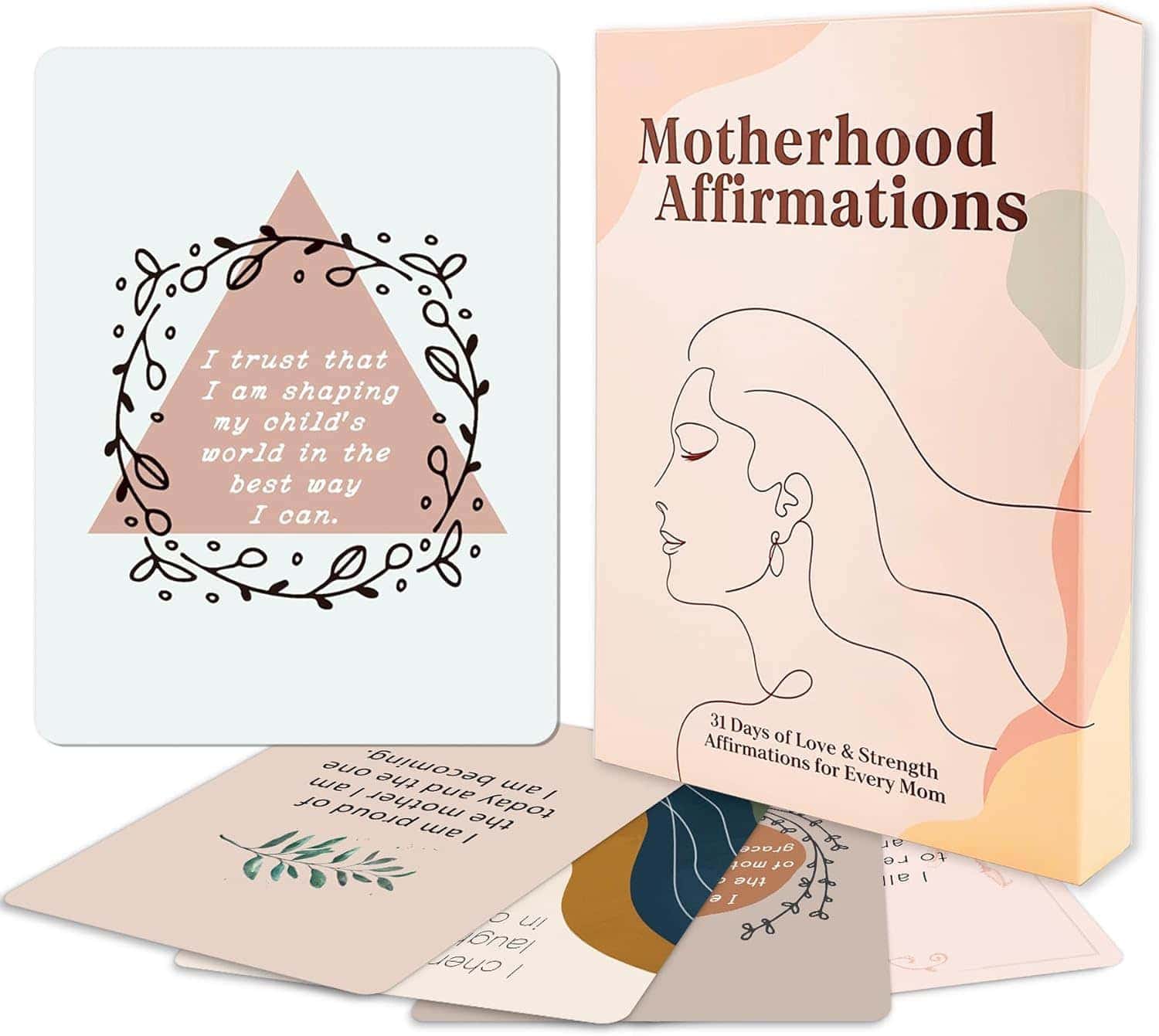 Box of "Motherhood Affirmations" cards with several cards displayed, including one that reads, "I trust that I am shaping my child's world in the best way I can.