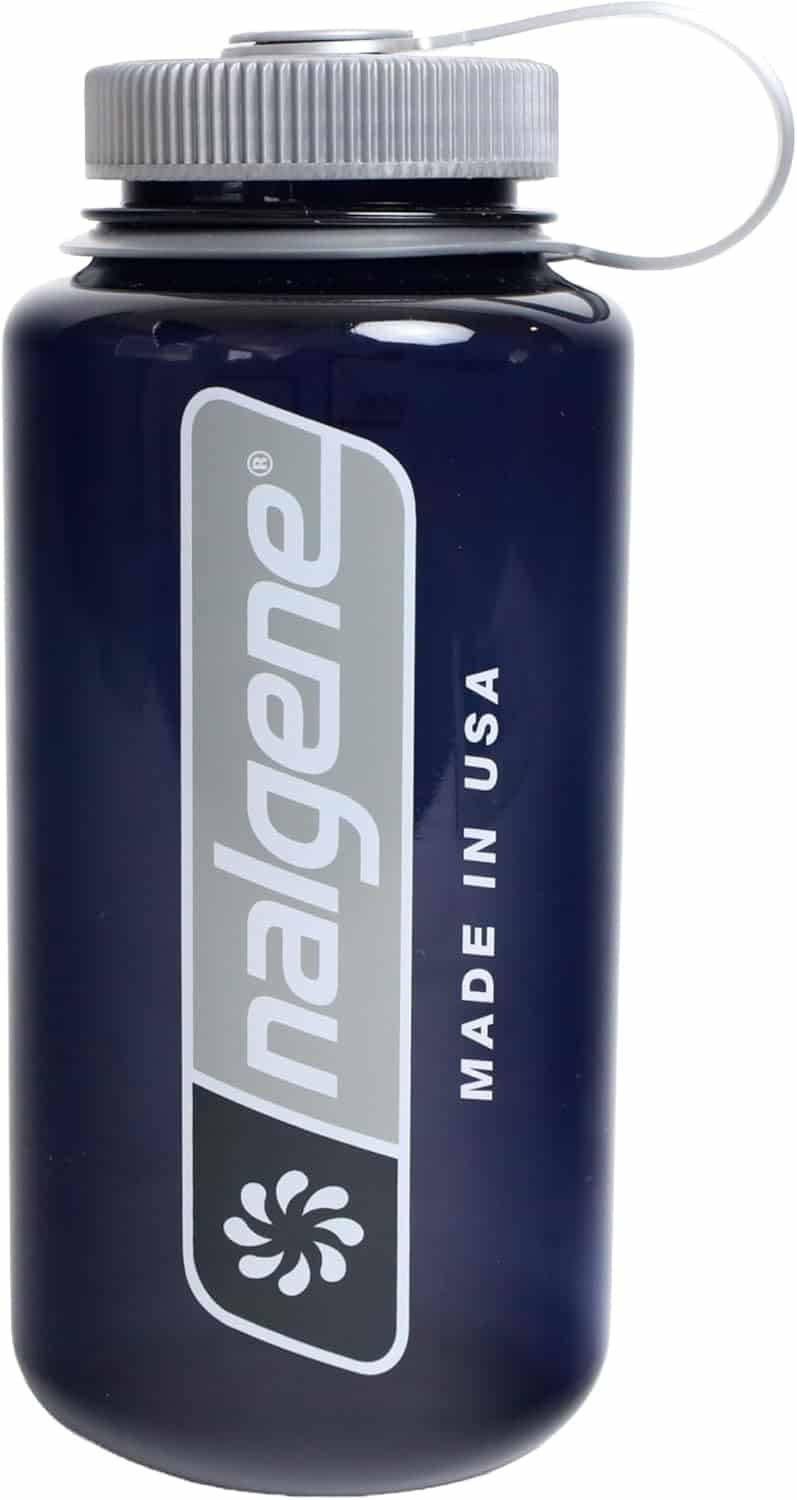 A dark blue Nalgene water bottle with a grey screw-on lid, featuring “nalgene” and “MADE IN USA” printed on the side.