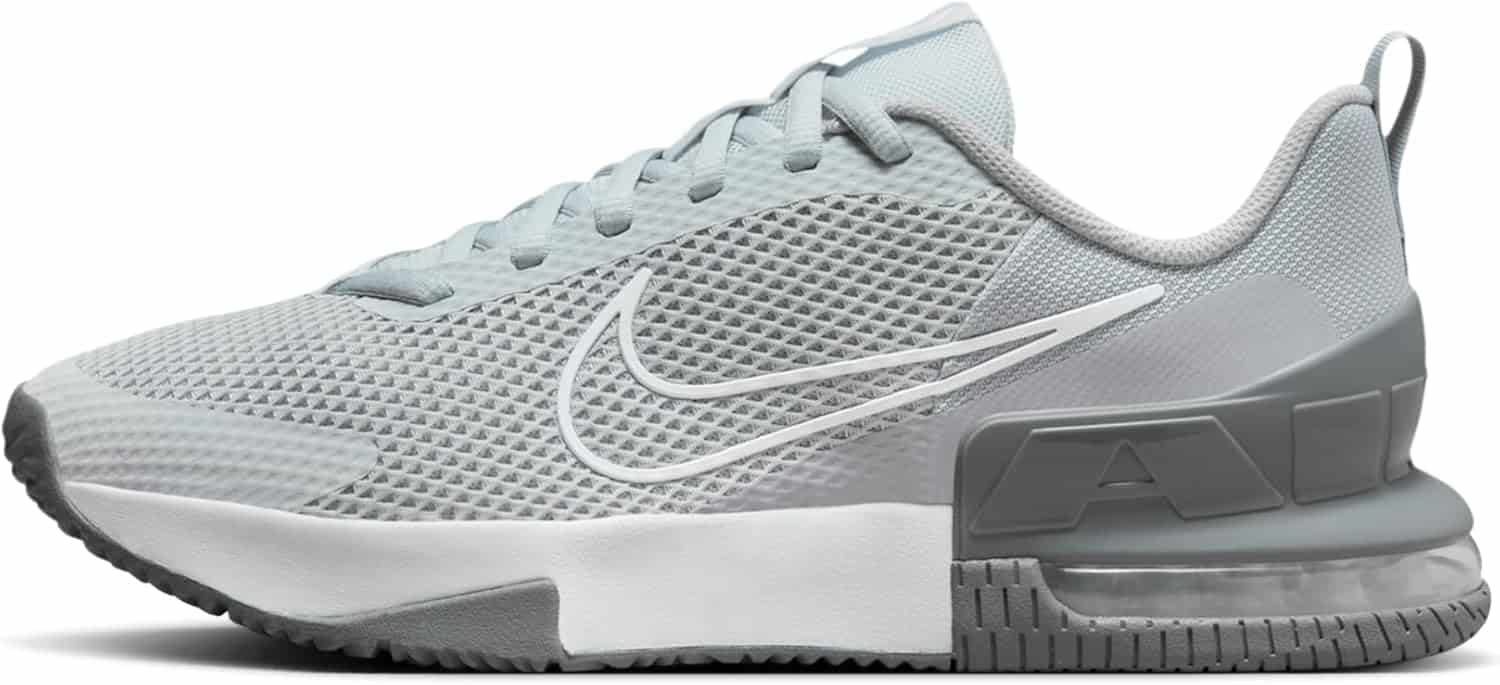 A light grey Nike athletic shoe with a white swoosh logo, mesh upper, cushioned white midsole, and visible air unit in the heel.