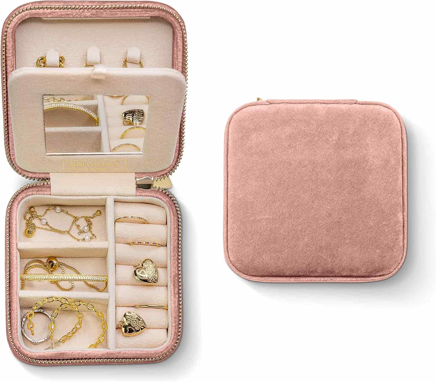 A pink velvet jewelry case, shown closed and open, with compartments holding various gold jewelry pieces including rings, bracelets, and necklaces.