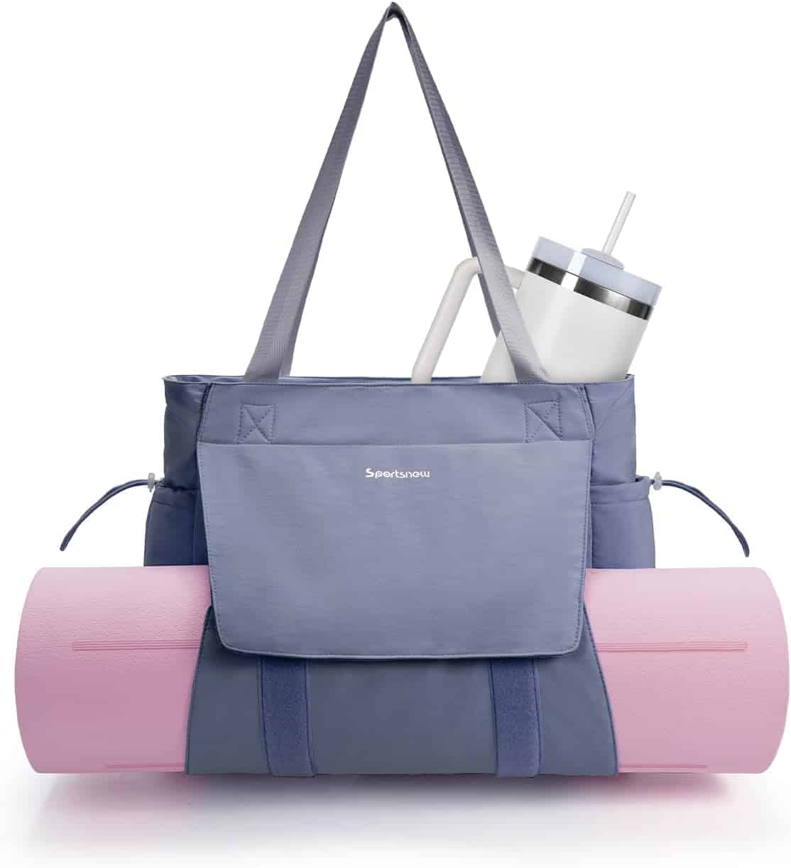 A blue gym bag with shoulder straps holds a straw tumbler in its pocket and has a pink yoga mat secured across the front.