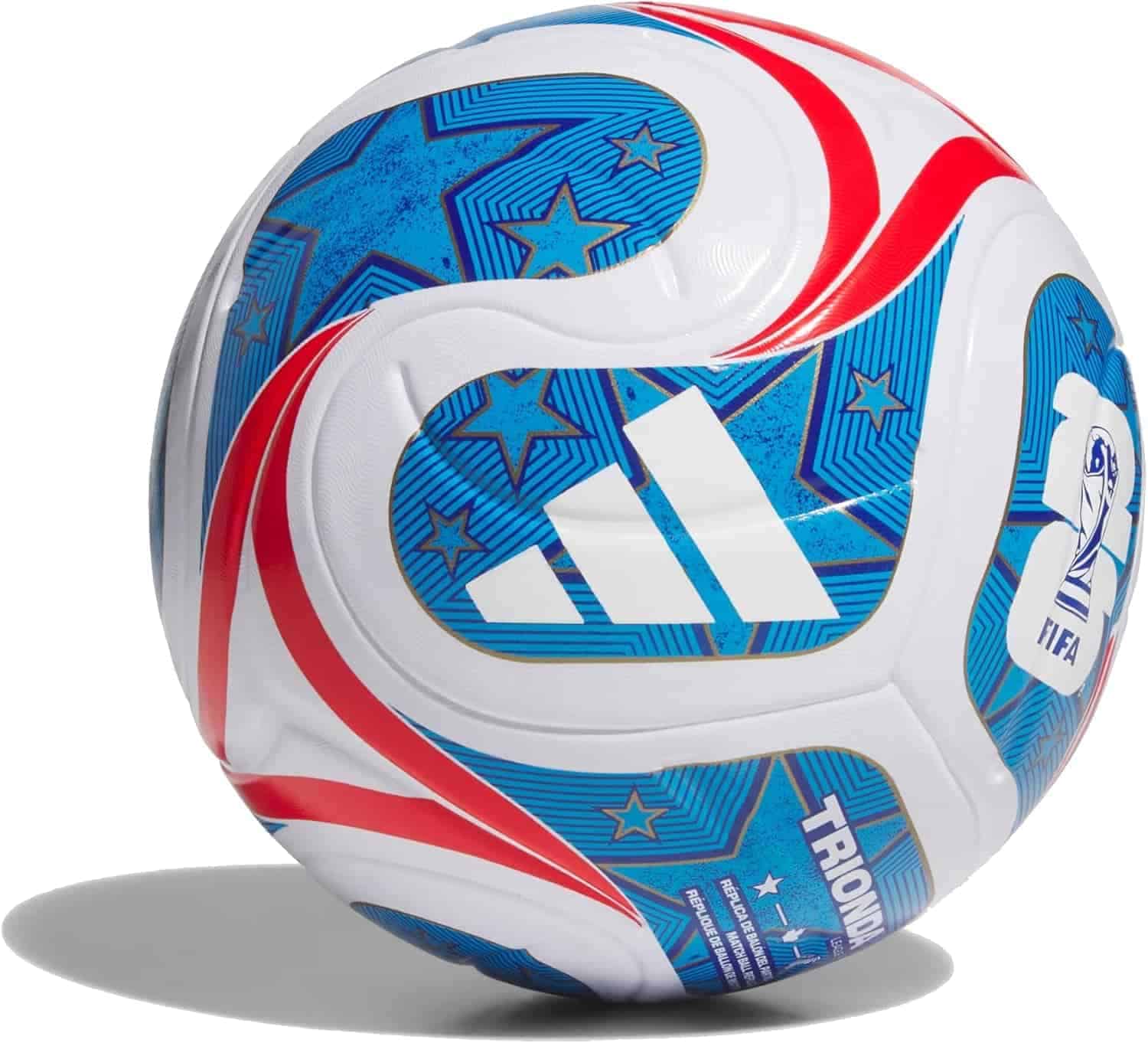 A blue and white Adidas soccer ball with red accents, featuring star patterns and the FIFA logo, resting on a plain surface.